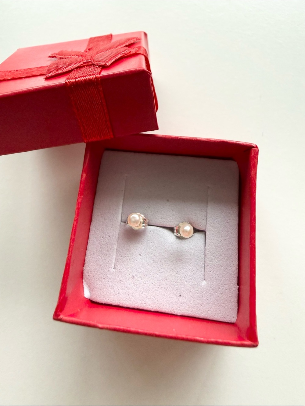 Tiny Fresh Water Pearl Stud Earrings- in sterling silver